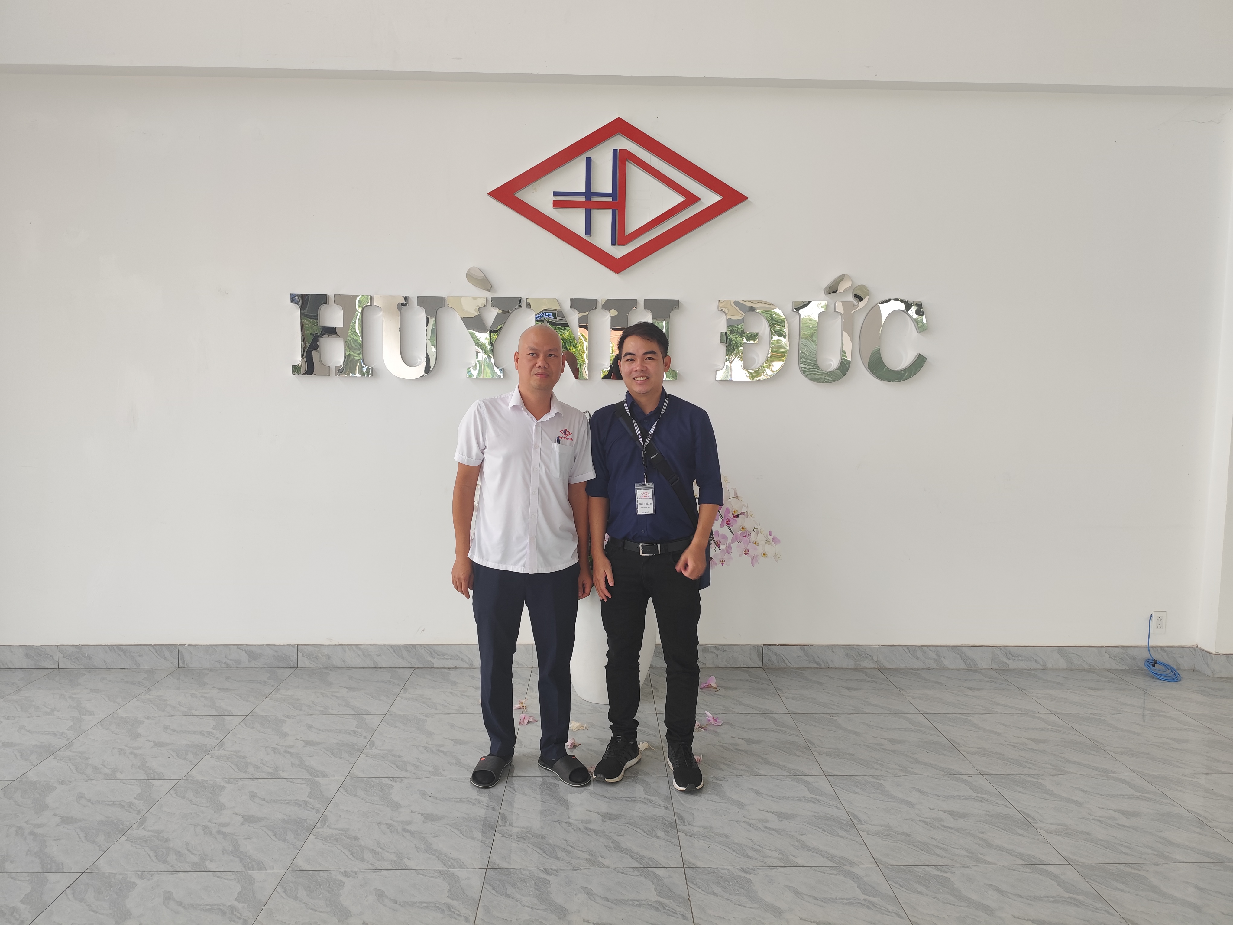 Photo with factory CEO.jpg